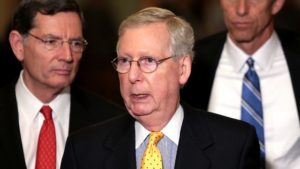McConnell lets an indicted Trump twist in the wind