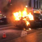 Six arrested after protesters attack businesses, set police car on fire in Atlanta