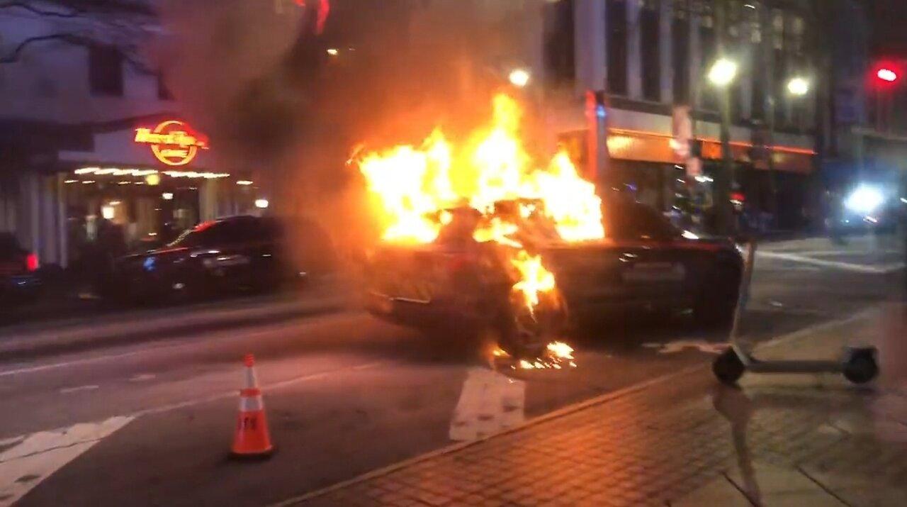 Six arrested after protesters attack businesses, set police car on fire in Atlanta